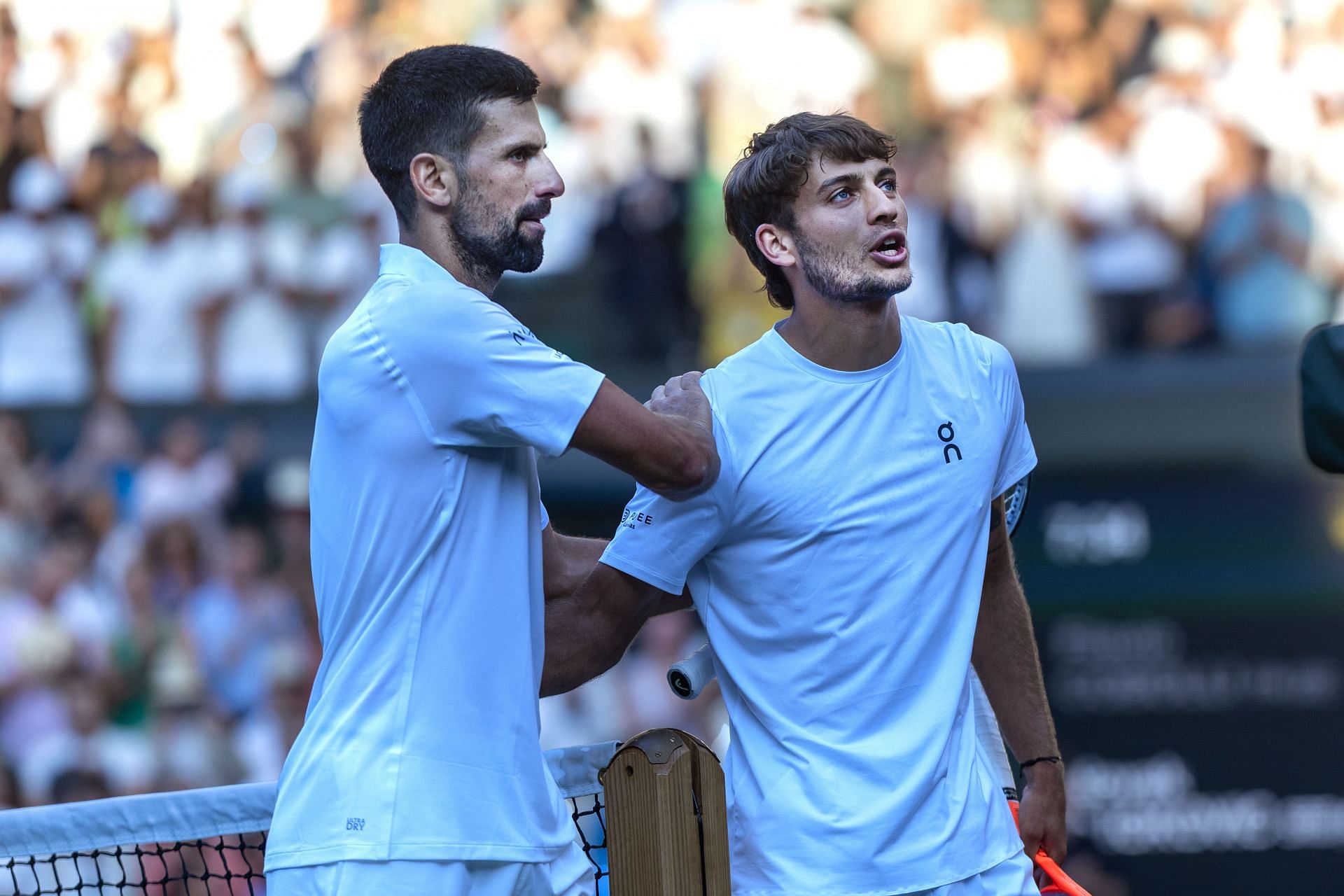 Novak Djokovic (left) and Flavio Cobolli (right) after the conclusion of their quarterfinal clash at the 2025 Wimbledon Championships (Source: Getty)